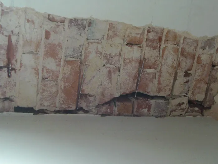 2. Mortar joints cut out across the crack