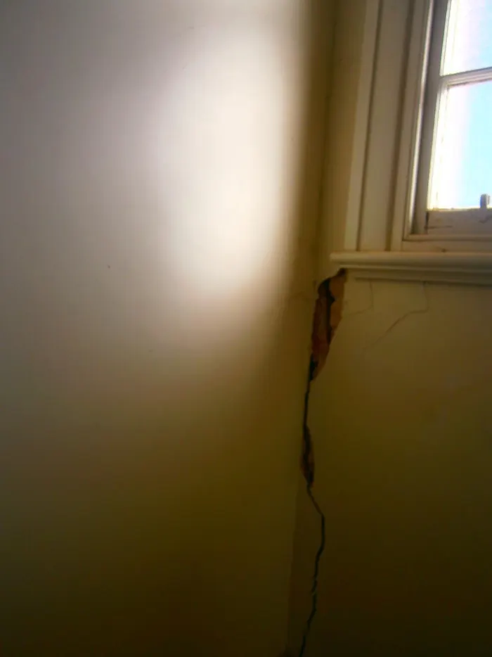 Crack in an internal wall beside a window frame