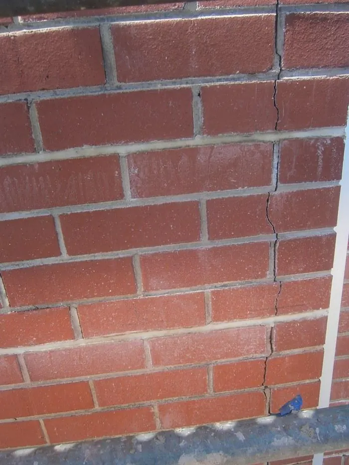 Vertical crack running through face brickwork